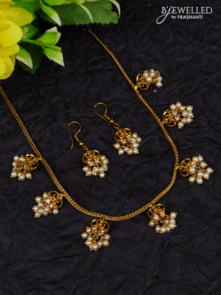 Antique attigai necklace lakshmi design with kemp & cz stones and pearl hangings