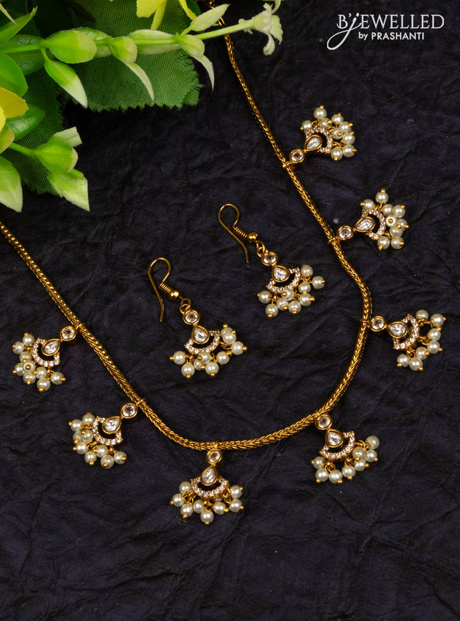 Antique attigai necklace with kundan & cz stones and pearl hangings