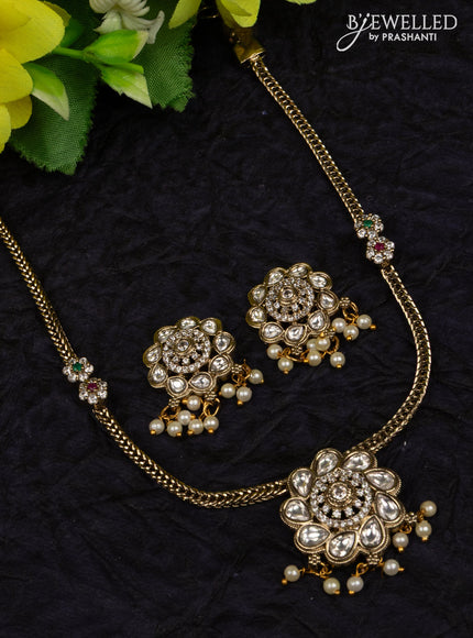 Attigai necklace with kundan & cz stones and pearl hangings in victorian finish