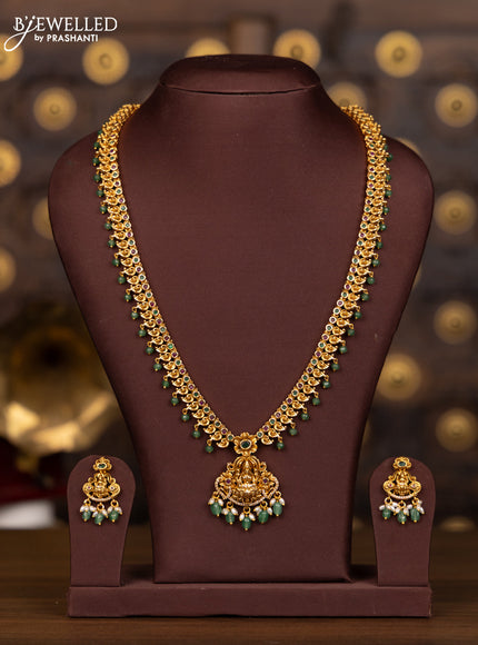 Antique haaram lakshmi pendant with kemp and cz stones in pearl & mint green beads hangings