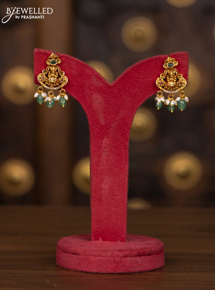 Antique haaram lakshmi pendant with kemp and cz stones in pearl & mint green beads hangings