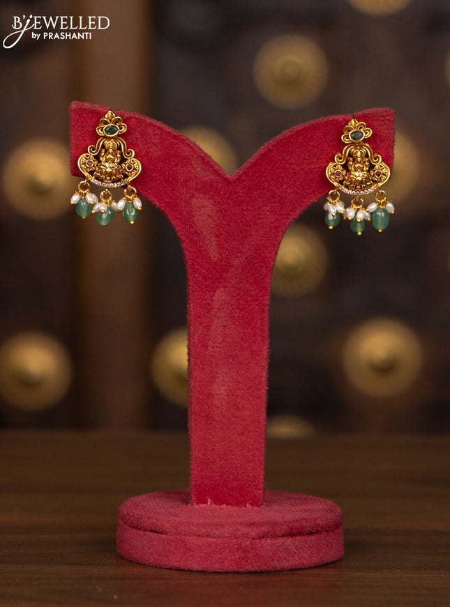 Antique haaram lakshmi pendant with kemp and cz stones in pearl & mint green beads hangings
