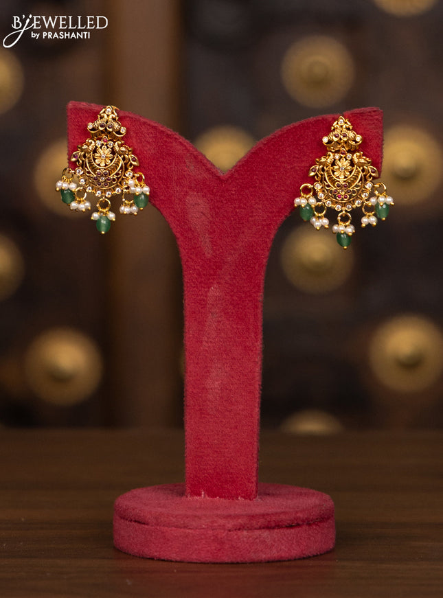 Antique haaram with kemp and kundan stones in pearl & mint green beads hangings