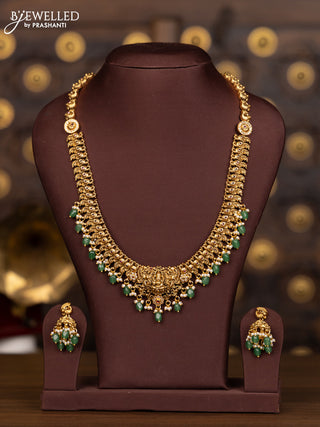 Antique haaram lakshmi design with pink kemp and cz stones in pearl & mint green beads hangings