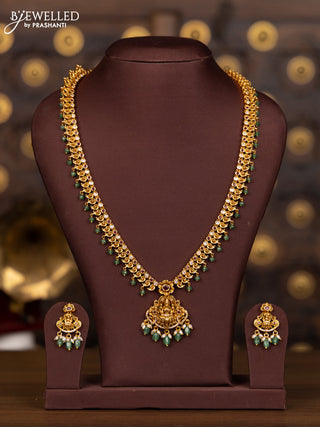 Antique haaram lakshmi pendant with pink kemp and cz stones in mint green beads hangings