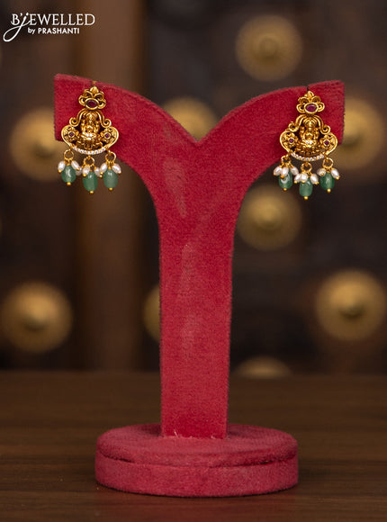 Antique haaram lakshmi pendant with pink kemp and cz stones in mint green beads hangings