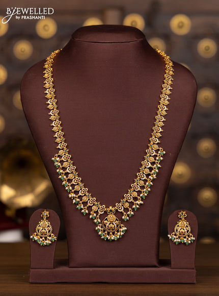 Antique haaram lakshmi design with kemp and cz stones in pearl & mint green beads hangings