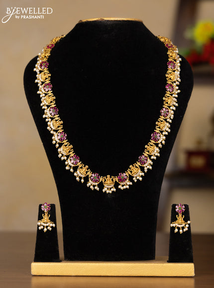 Antique guttapusalu haaram lakshmi design with kemp and cz stones in pearl hangings