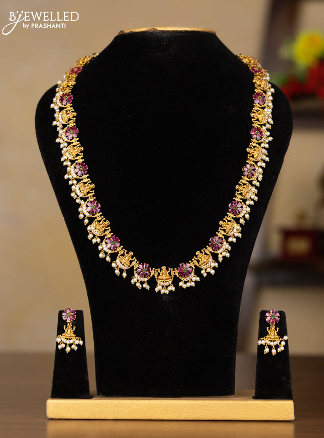 Antique guttapusalu haaram lakshmi design with kemp and cz stones in pearl hangings