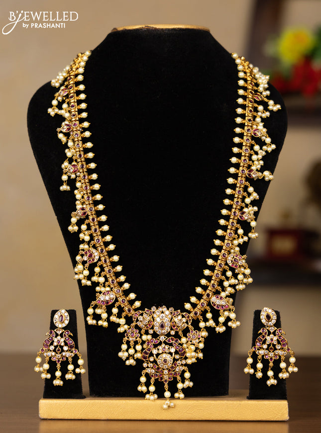 Antique guttapusalu haaram with pink kemp and cz stones in pearl hangings