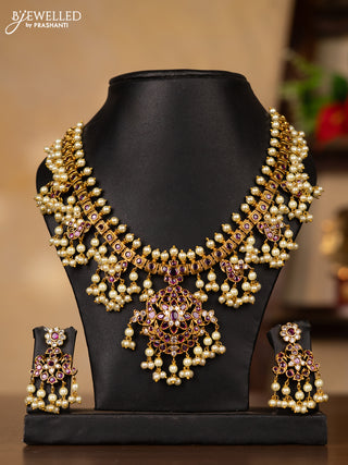 Antique guttapusalu necklace peacock design with pink kemp & cz stones and pearl hangings