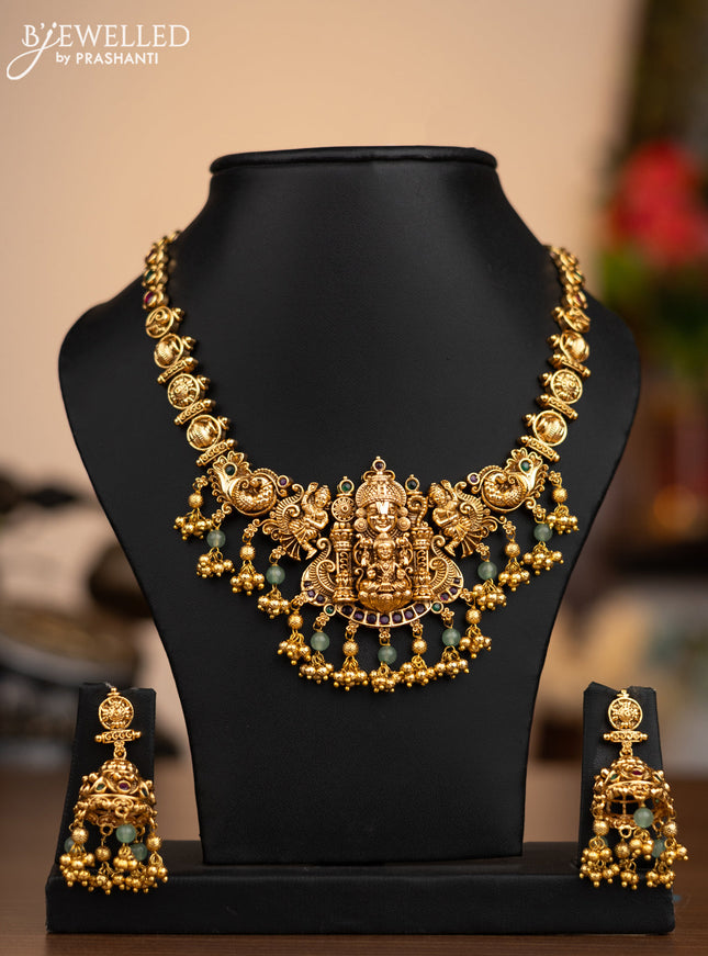Antique necklace lakshmi pendant with kemp stones and green & golden beads hangings