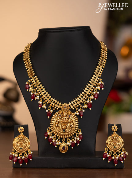 Antique necklace lakshmi pendant with kemp stones and pink beads hanging