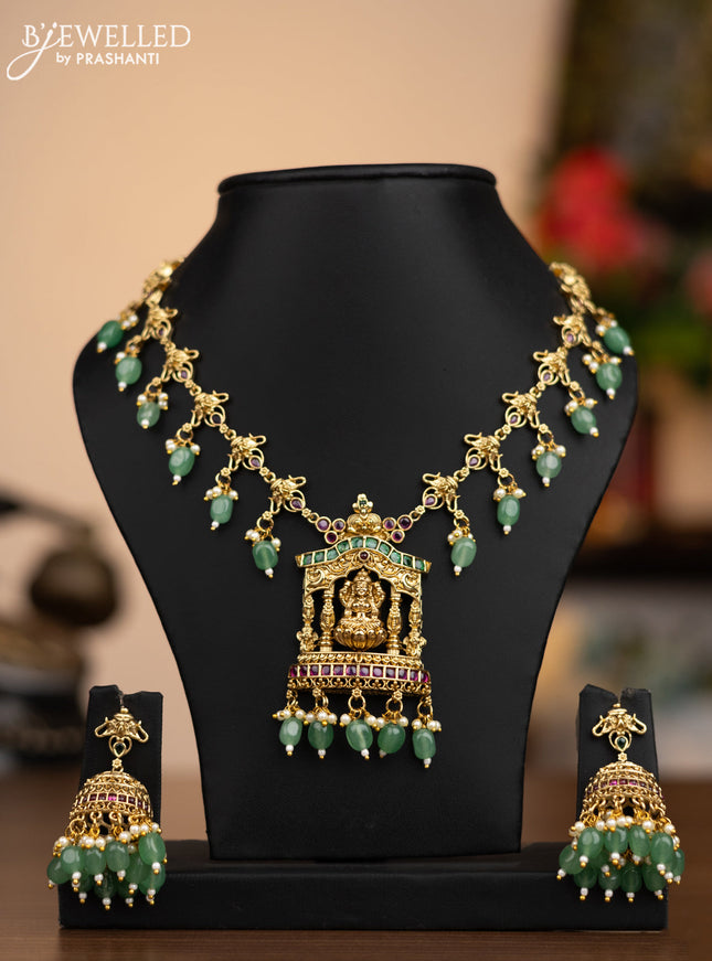 Antique necklace lakshmi pendant with kemp stones and pearl & green besds hanging