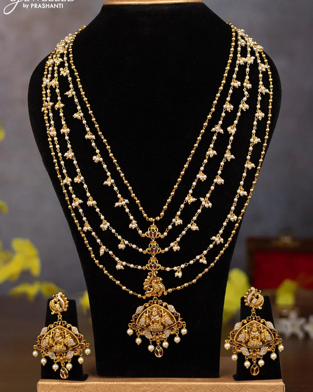 Pearl multilayer haaram lakshmi pendant with kemp & cz stones and pearl hangings