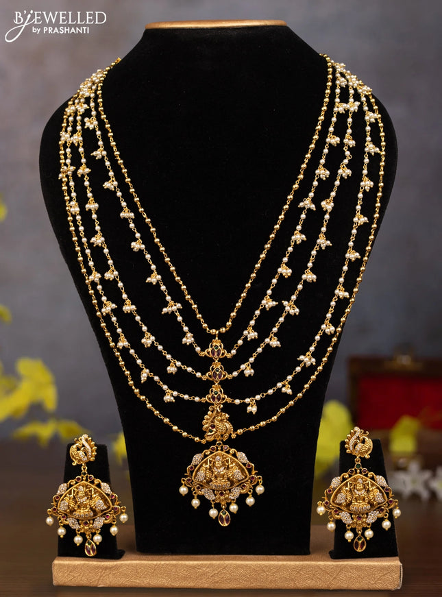 Pearl multilayer haaram lakshmi pendant with kemp & cz stones and pearl hangings