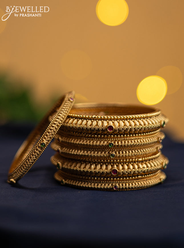 Antique rajawadi bangle with kemp stones