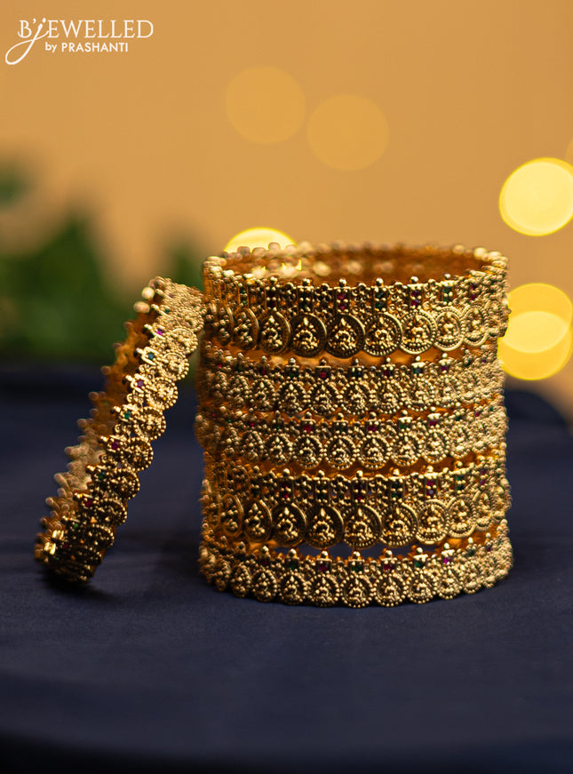Antique rajawadi bangle lakshmi design with kemp stones