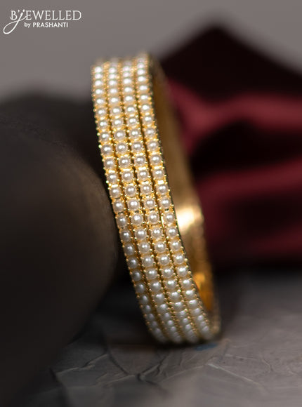 Pearl rajawadi bangle with pearls in gold finish