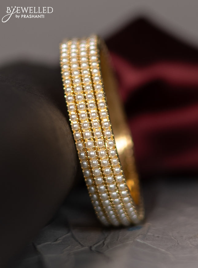 Pearl rajawadi bangle with pearls in gold finish
