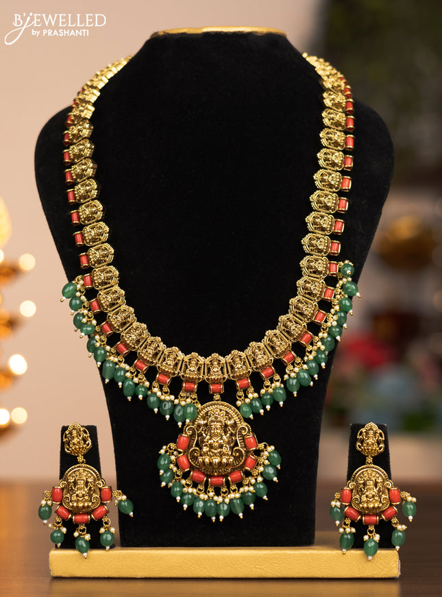 Antique haram lakshmi design with pavalam and green beads hangings