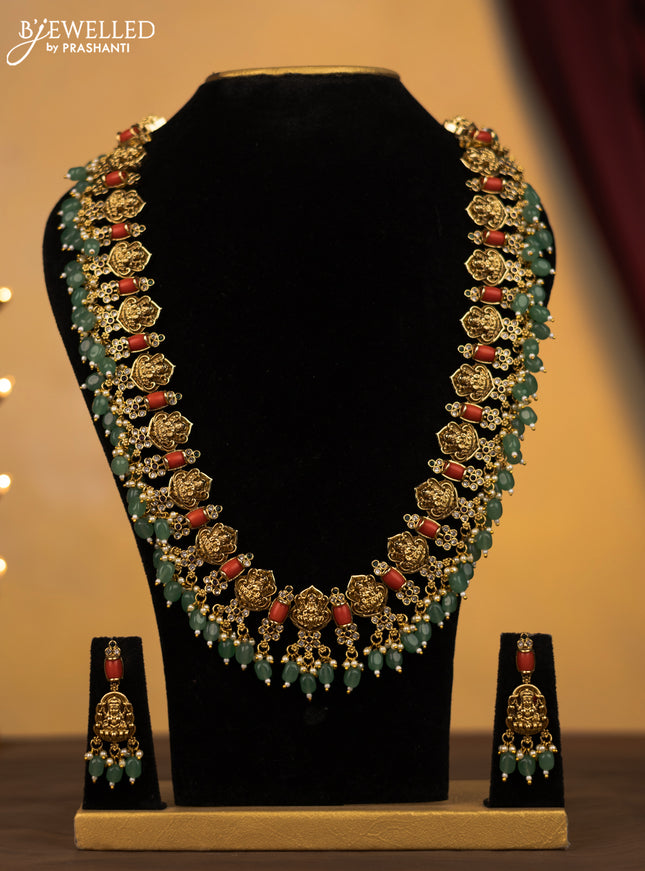 Antique haram lakshmi and flower design with pavalam & cz stones and green beads hangings