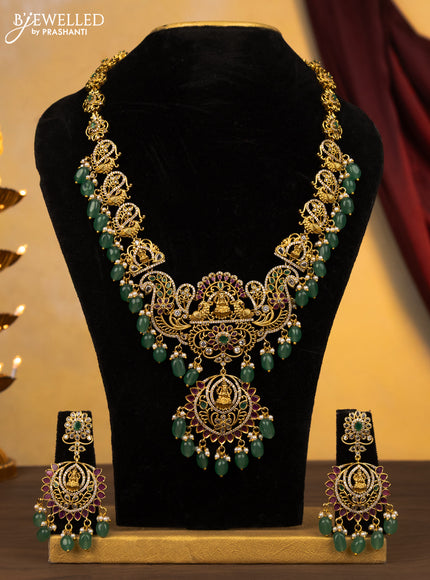 Antique haram lakshmi design with ruby & cz stones and green beads hangings