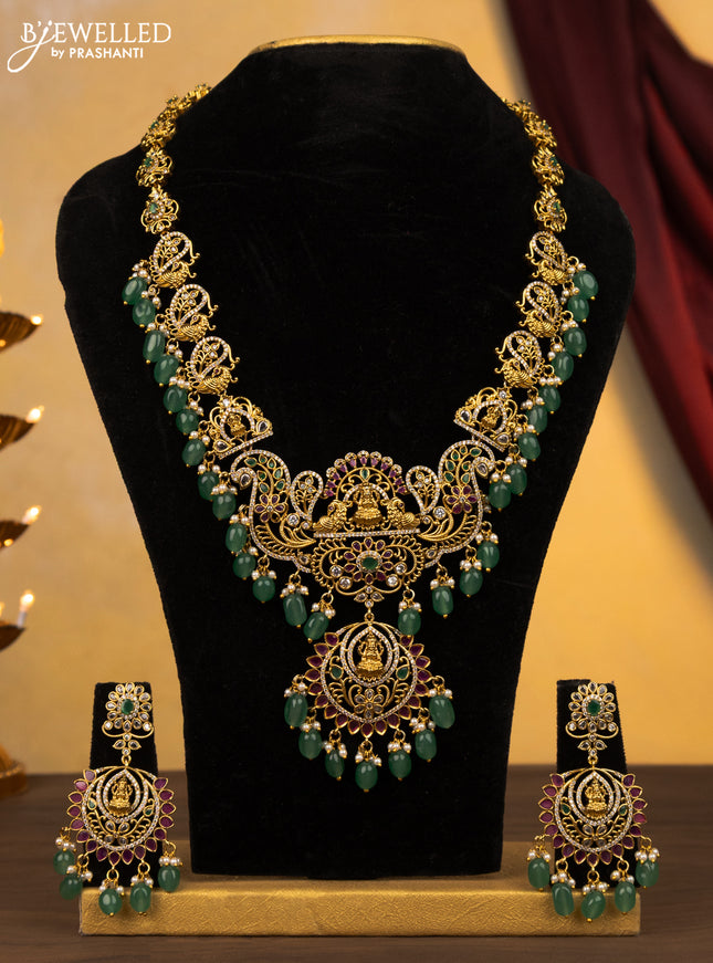Antique haram lakshmi design with ruby & cz stones and green beads hangings