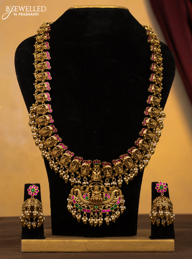 Jadau haram lakshmi maanga design jadau stones with golden beads and pearl hangings
