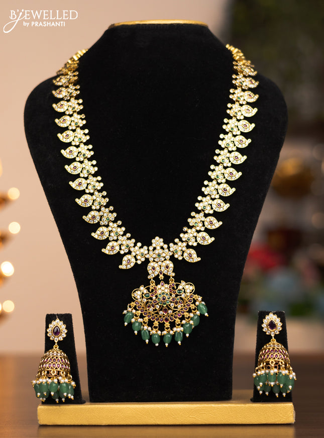 Antique haram maanga design with ruby ,cz stones & green beads and pearl hangings