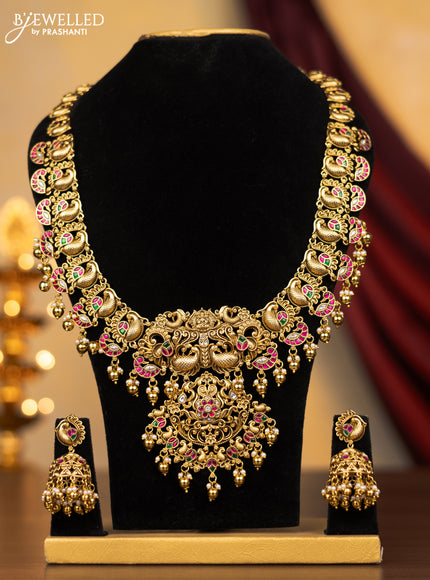 Jadau haram peacock design with jadau kundan stones and gold beads & pearl hangings