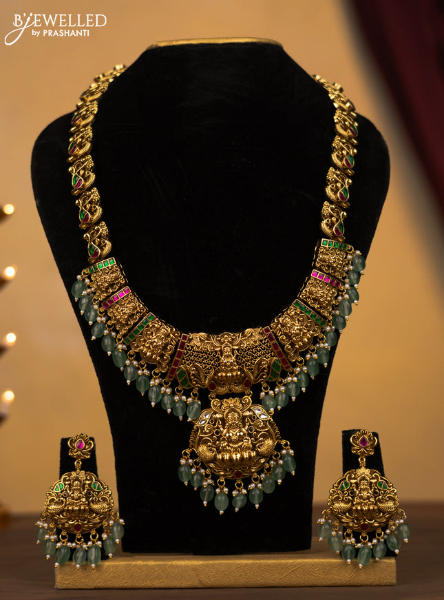 Jadau haram lakshmi design with jadau kundan stones and green beads & pearl hangings
