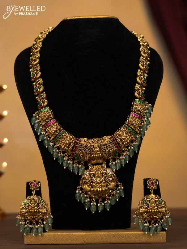 Jadau haram lakshmi design with jadau kundan stones and green beads & pearl hangings
