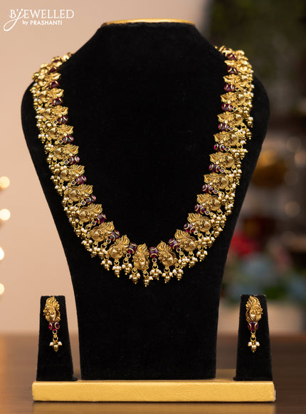 Antique haram with ruby stones and gold beads and pearl hangings