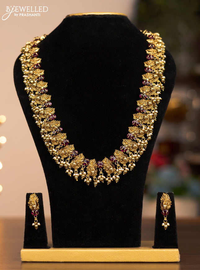Antique haram with ruby stones and gold beads and pearl hangings
