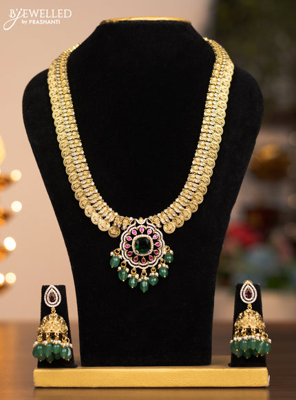 Antique haram lakshmi kasu mala design with ruby ,emerald and gold beads and pearl hangings