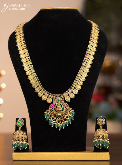Antique haram lakshmi kaasu mala design with jadau kundan and kemp stones and green beads and pearl hangings