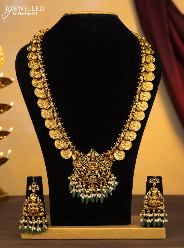Antique haram kakshmi kasu design with kemp & cz stones and pearl & green beads hanging