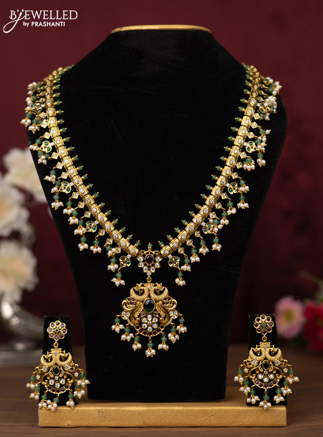 Antique guttapusalu haram double peacock design with ruby & emerlad and cz stones with pearl hangings