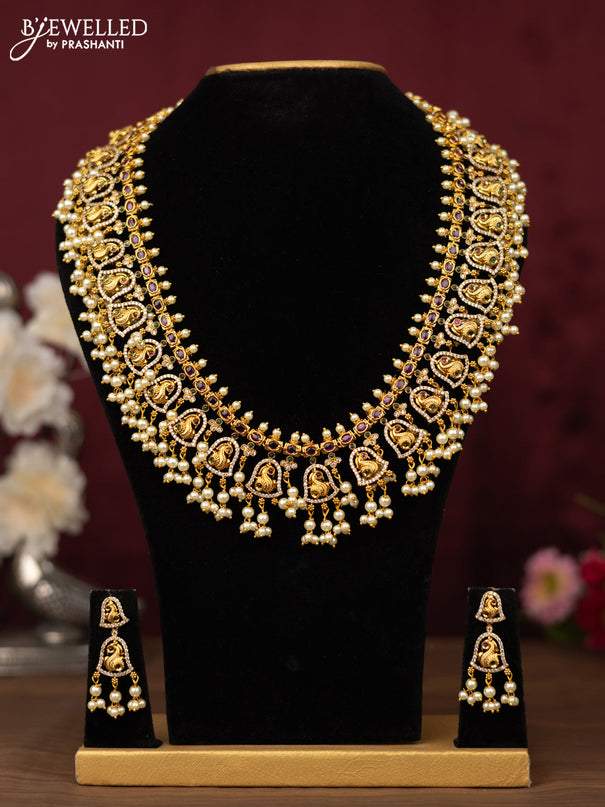 Antique guttapusalu haram peacock design with kemp & cz stones and pearl hangings