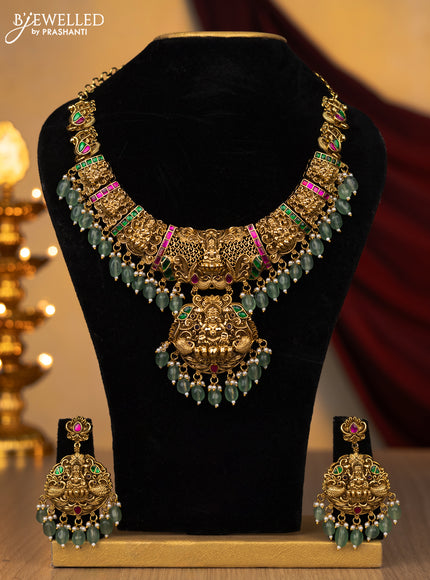 Jadau necklace lakshmi design with jadau stones and pearl & mint green beads hanging