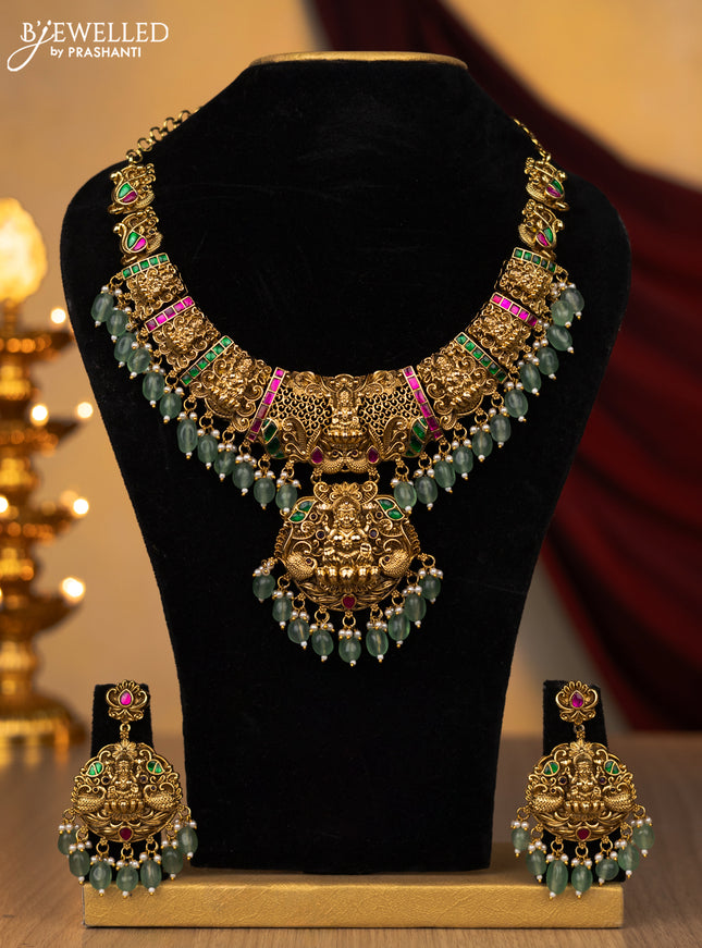 Jadau necklace lakshmi design with jadau stones and pearl & mint green beads hanging