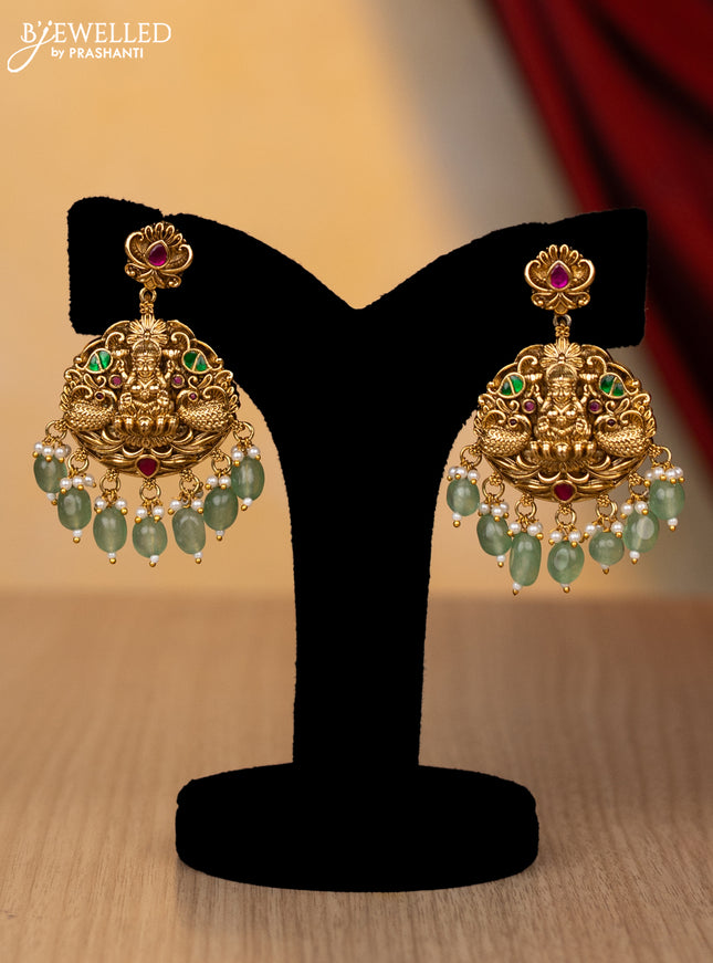 Jadau necklace lakshmi design with jadau stones and pearl & mint green beads hanging