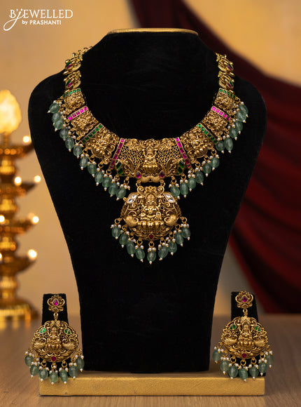 Jadau necklace lakshmi design with jadau kundan stones and pearl & mint green beads hanging