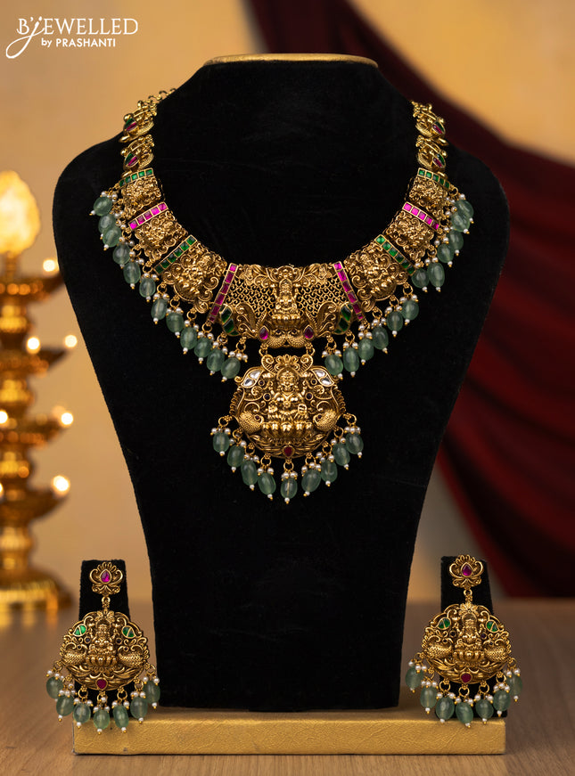 Jadau necklace lakshmi design with jadau kundan stones and pearl & mint green beads hanging
