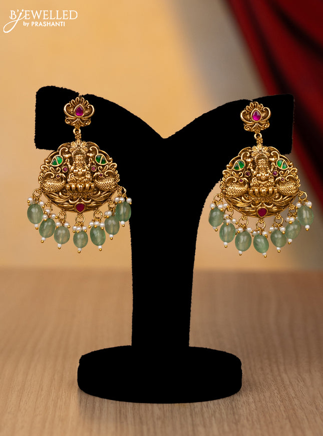 Jadau necklace lakshmi design with jadau kundan stones and pearl & mint green beads hanging