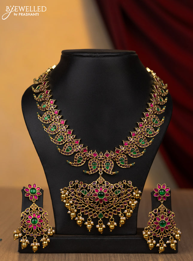 Jadau necklace manga pattern with jadau stones and pearl & mint green beads hanging