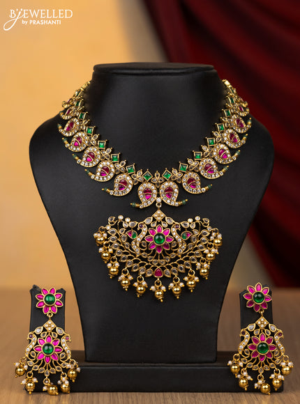 Jadau necklace manga pattern with jadau cz stones and pearl & golden beads hanging