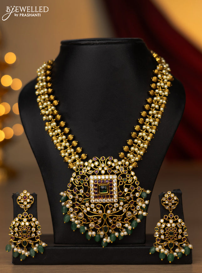 Antique necklace with kemp & cz stones and pearl & green beads hanging