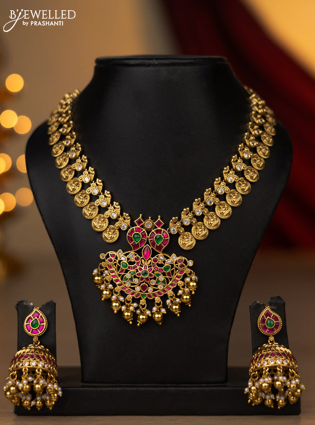 Jadau necklace lakshmi kasu design with jadau kundan stones and pearl & golden beads hanging